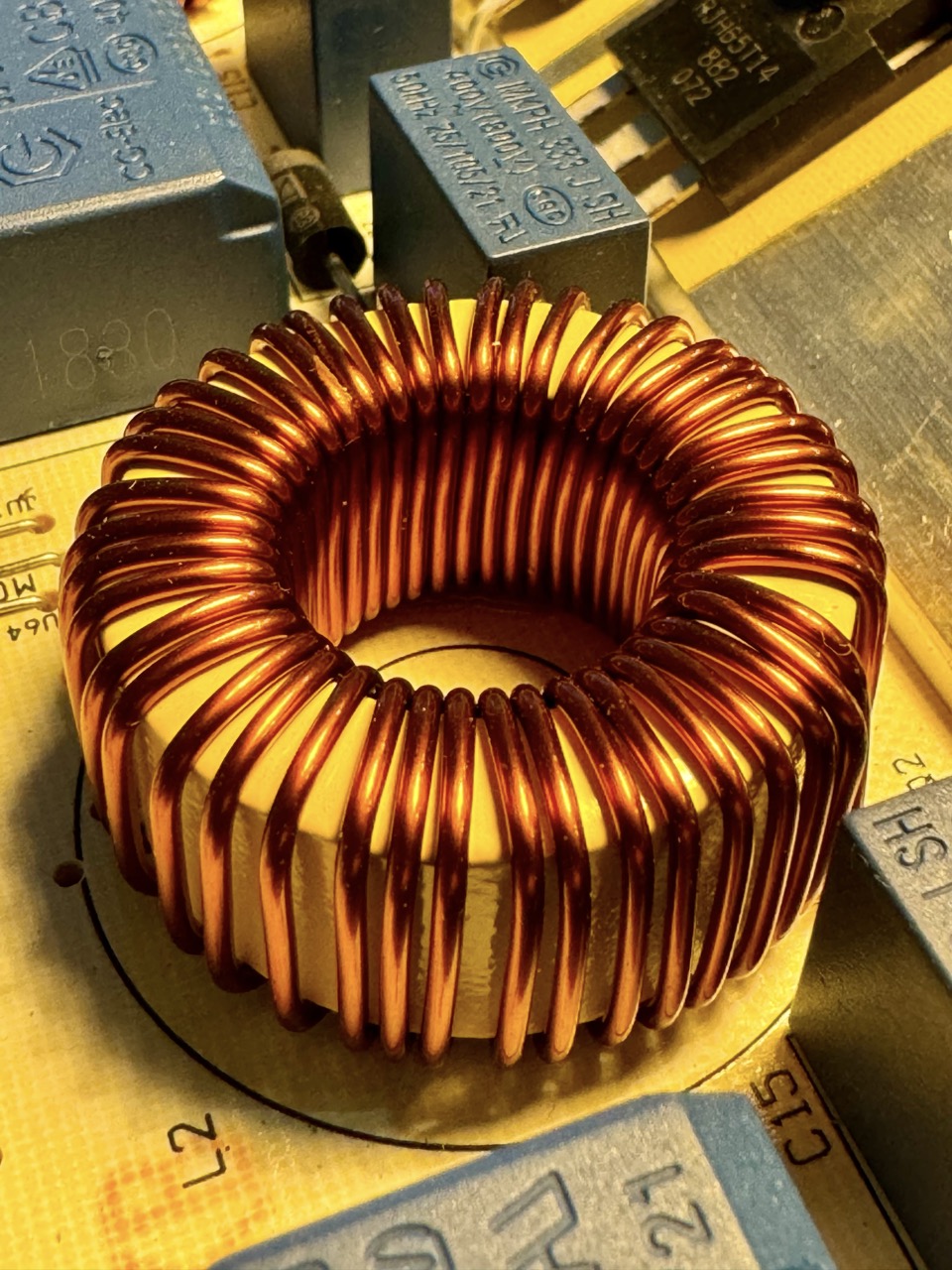 Inductor: A coil-shaped electronic component with two leads, designed to store energy in a magnetic field, commonly used in filtering, energy storage, and tuning circuits.